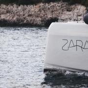 Sunreef 50 Zara luxury sailing yacht on calm waters.