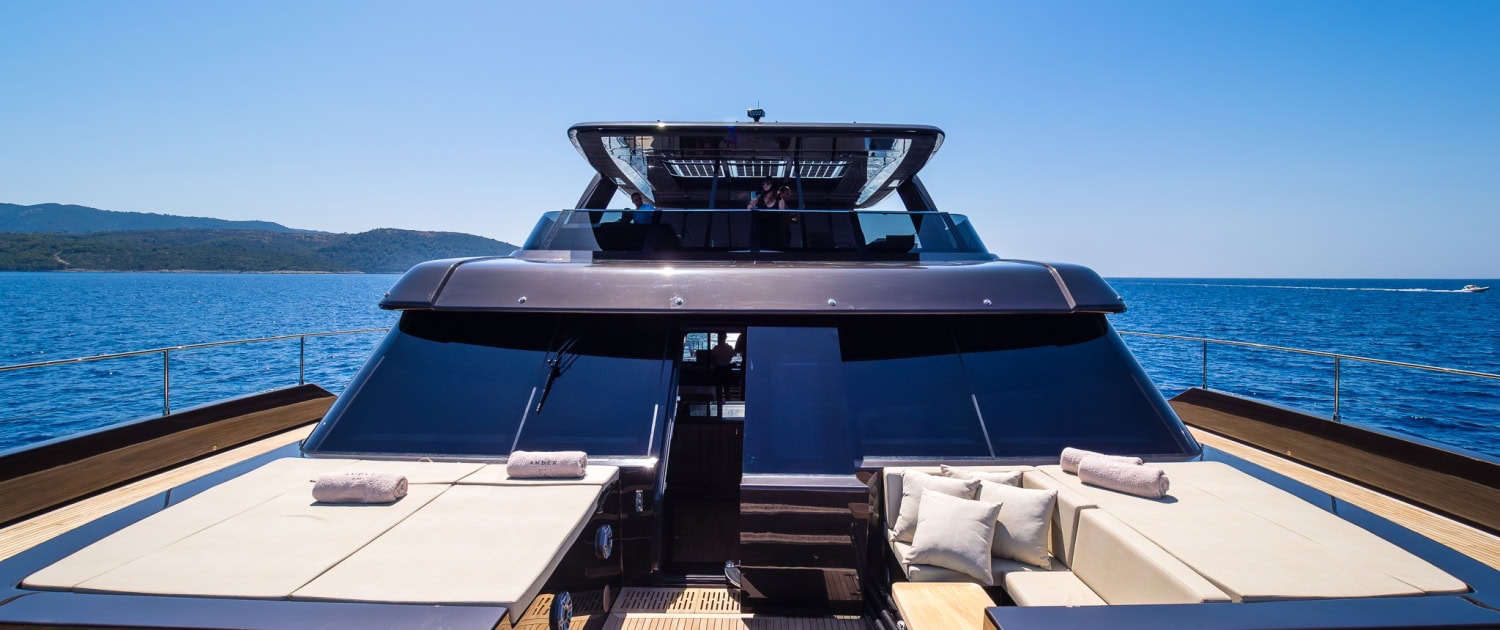 Sunreef Power Yacht Deck Sunreef Power yacht deck with sun loungers and outdoor seating.