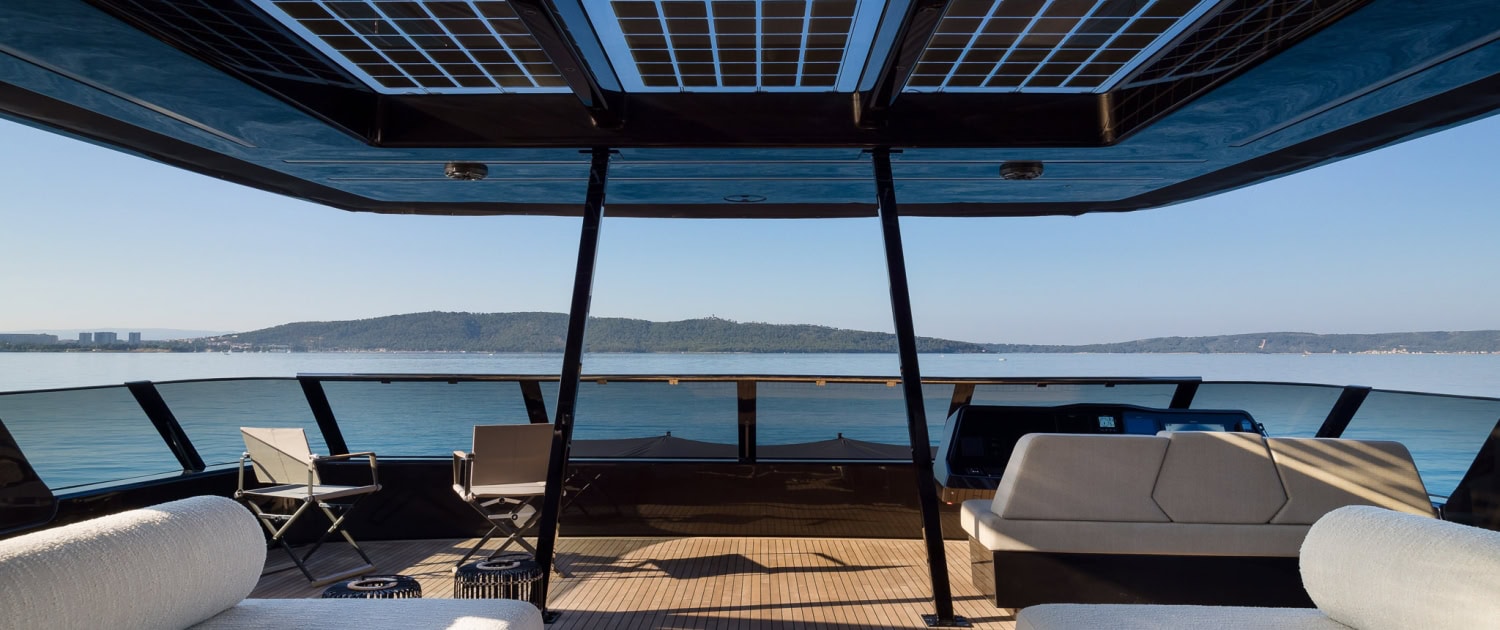 Luxury Yacht Deck with Ocean View Luxury yacht deck with panoramic ocean view and modern seating area.