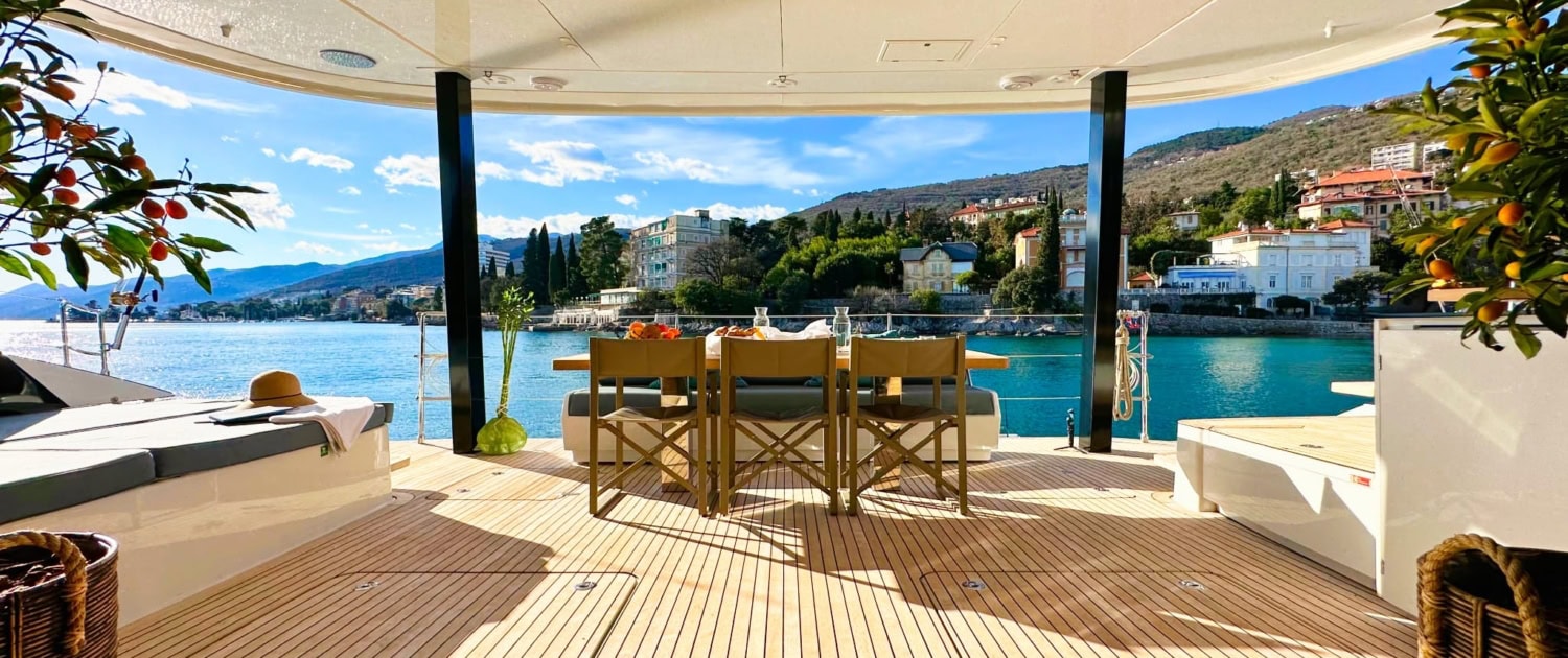 Luxury Sunreef 80 yacht deck with panoramic water views.