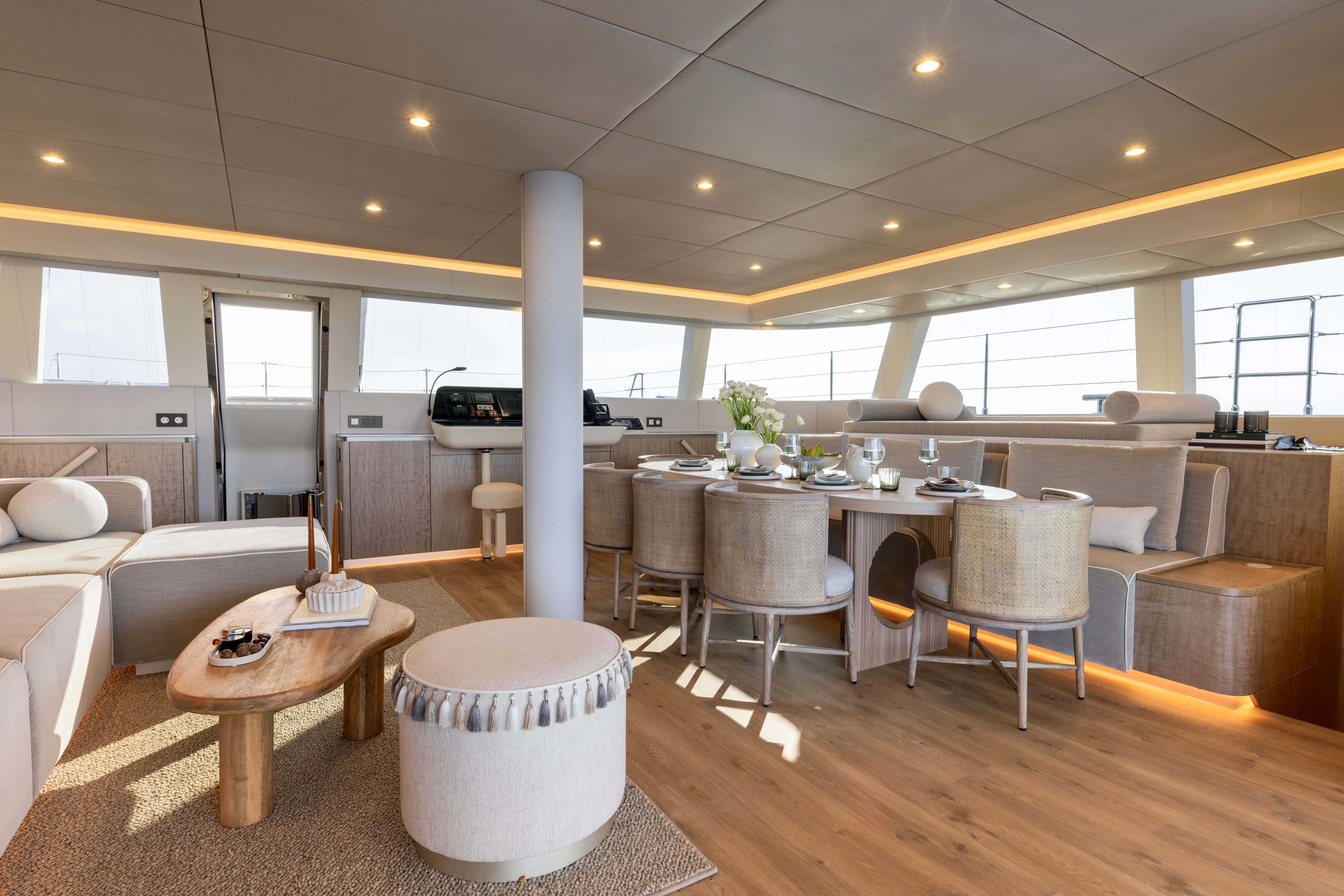 Luxurious yacht interior with elegant seating and modern decor.