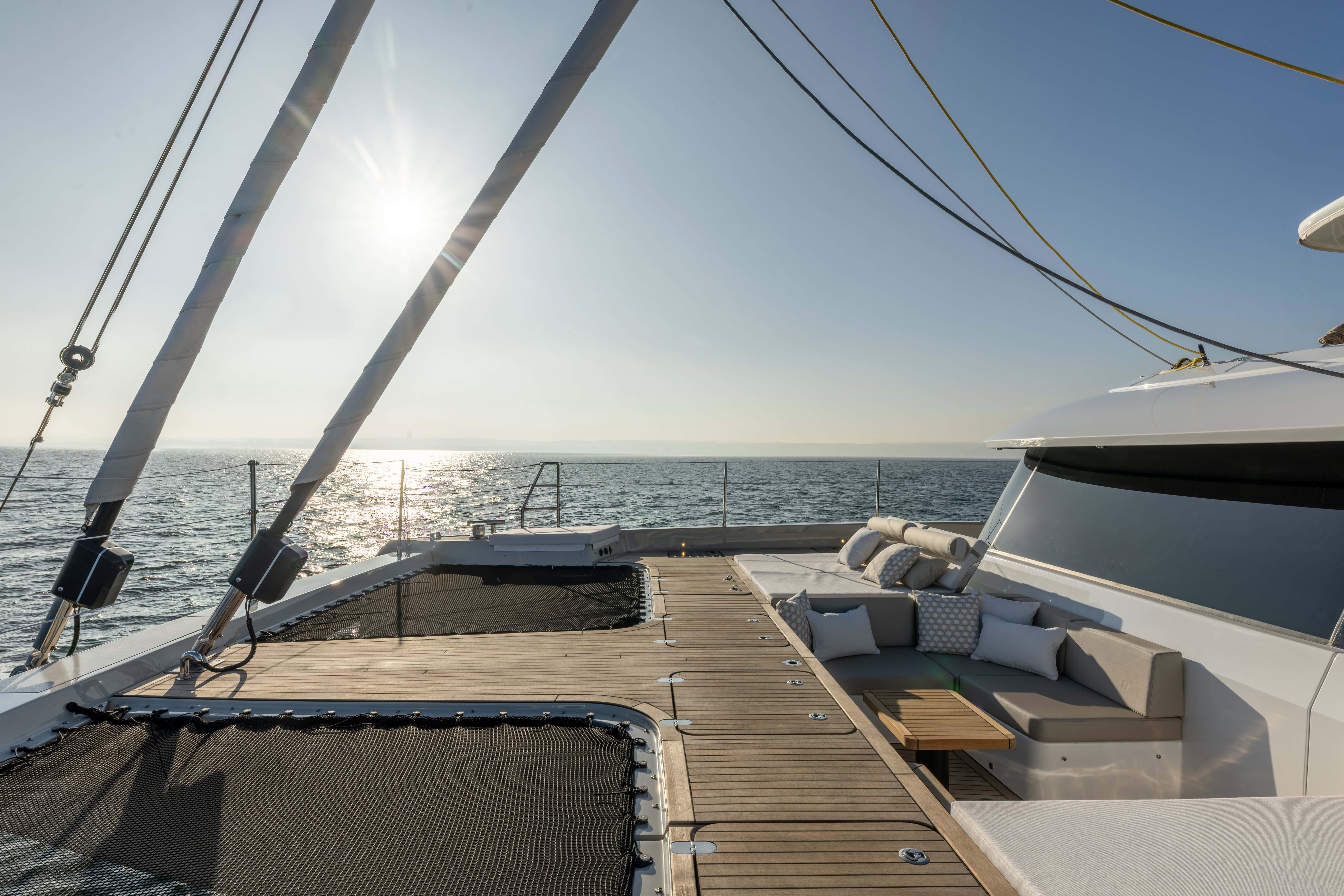 Yacht deck of Sunreef 60 SPICE OF LIFE with lounge area and ocean view.